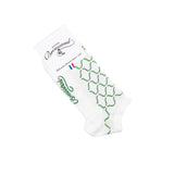 Paire de chaussettes invisibles basses blanches à motifs verts géométriques, emballée sous étiquette Maison Broussaud.