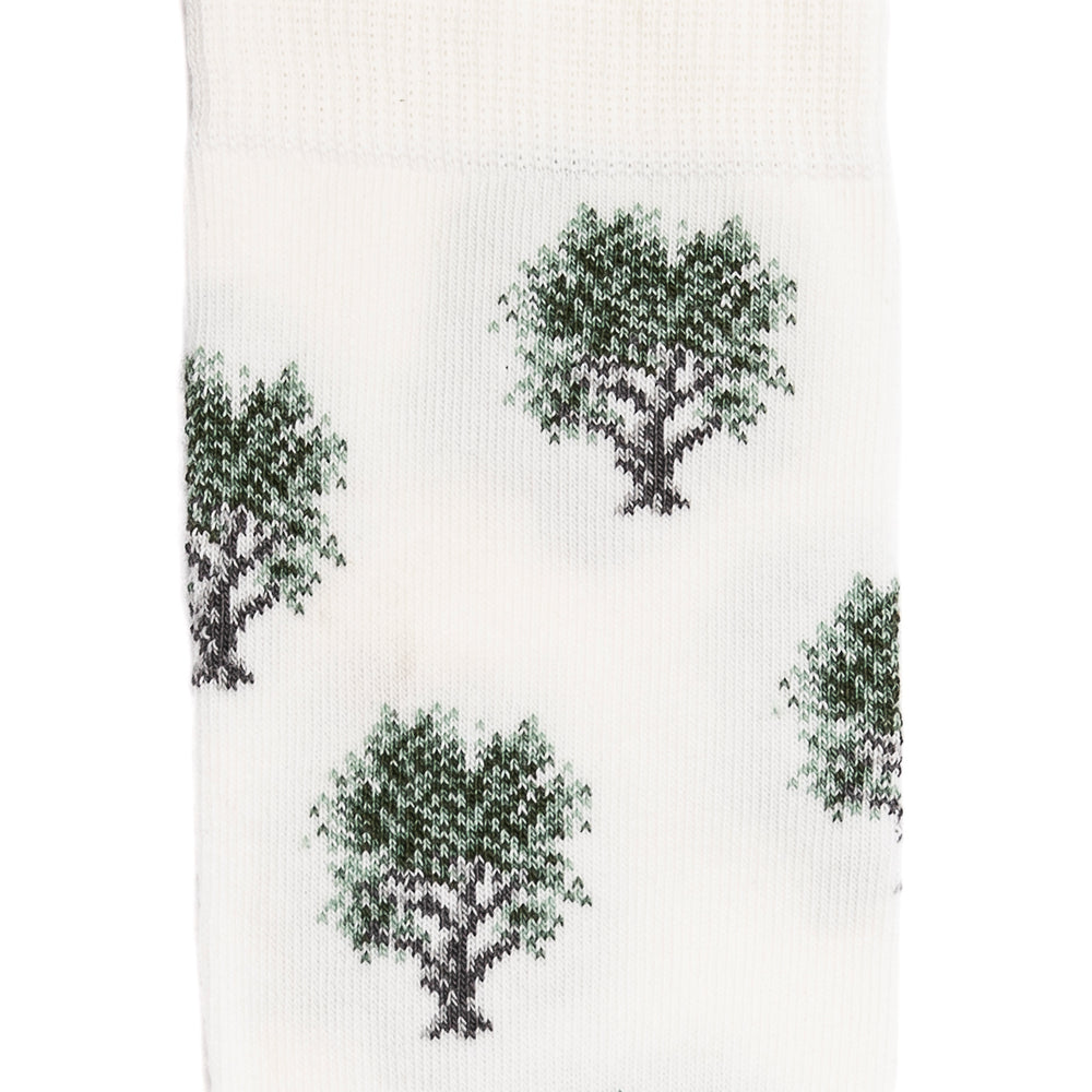 Détail motif arbre sur chaussette homme haute blanche