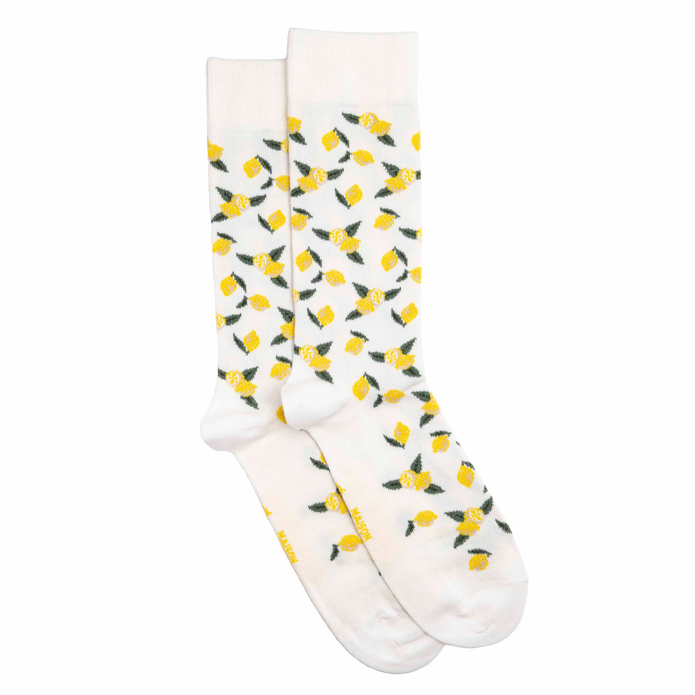 Chaussette femme mi-haute blanche à motifs citrons jaunes et verts avec packaging Maison Broussaud.