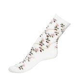 Chaussette femme mi-haute blanche à motifs cerises rouges et fleurs roses.